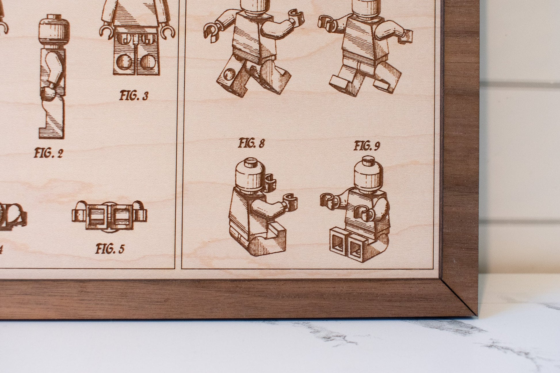 Medium wood engraved patent information and pictures for Lego brick and mini-figs